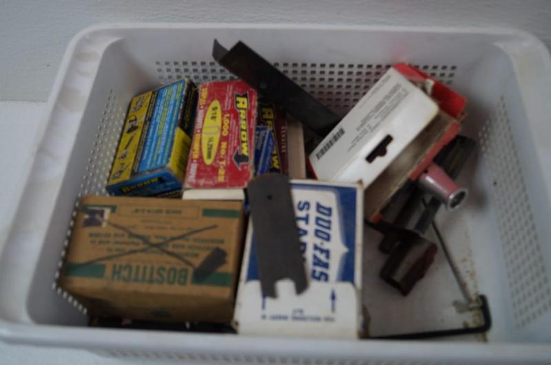 Basket of Various Staplers and Staples