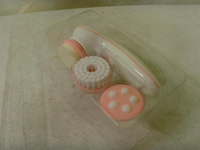 lot 52 image: Facial Scrubber