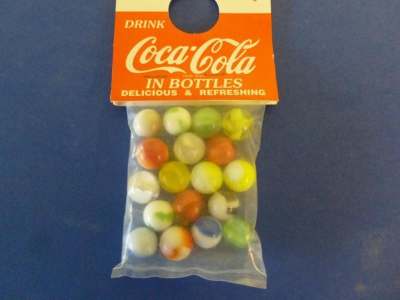 A pack of collectible Coca-Cola pro...