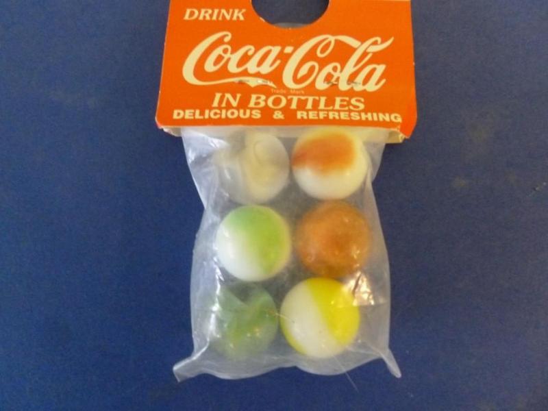 A pack of collectible Coca-Cola pro...