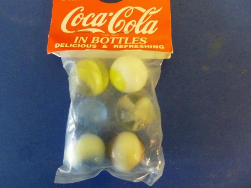 A pack of collectible Coca-Cola pro...