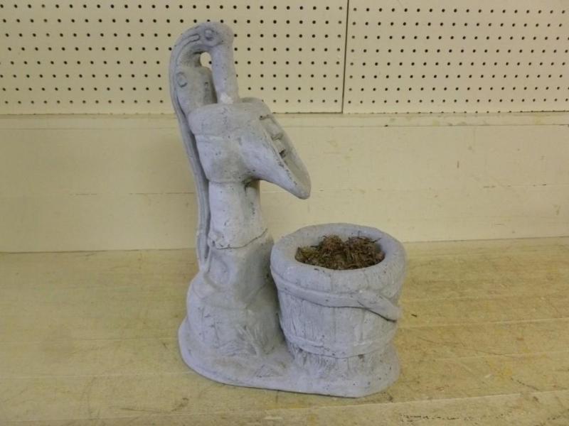 Large cement hand pump flower plant...