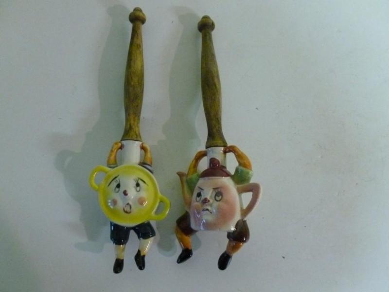 A pair of vintage porcelain and woo...