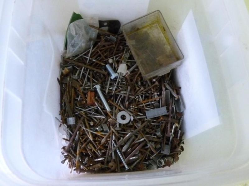 Large container of nails, screws an...