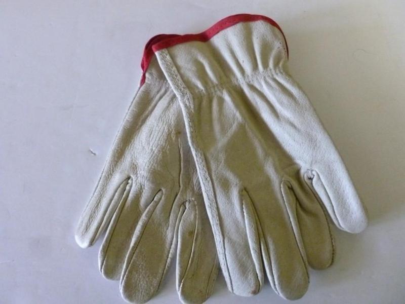 A pair of new leather work gloves s...