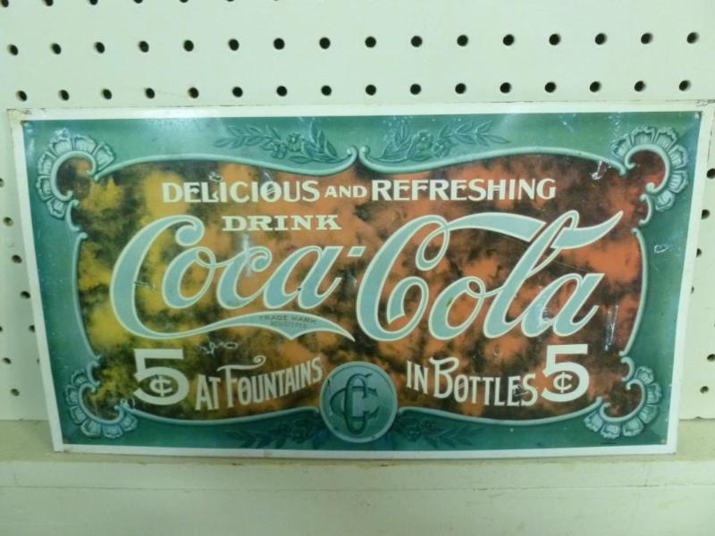 Drink Coca-Cola metal sign that mea...