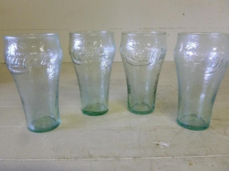 Set of four matching Coca-Cola embo...