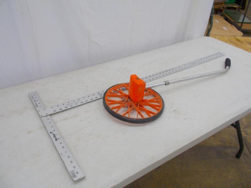 Measuring wheel and T-Square both i...