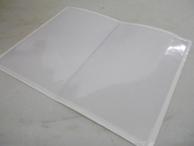 A box of 590, adhesive backed, clea...