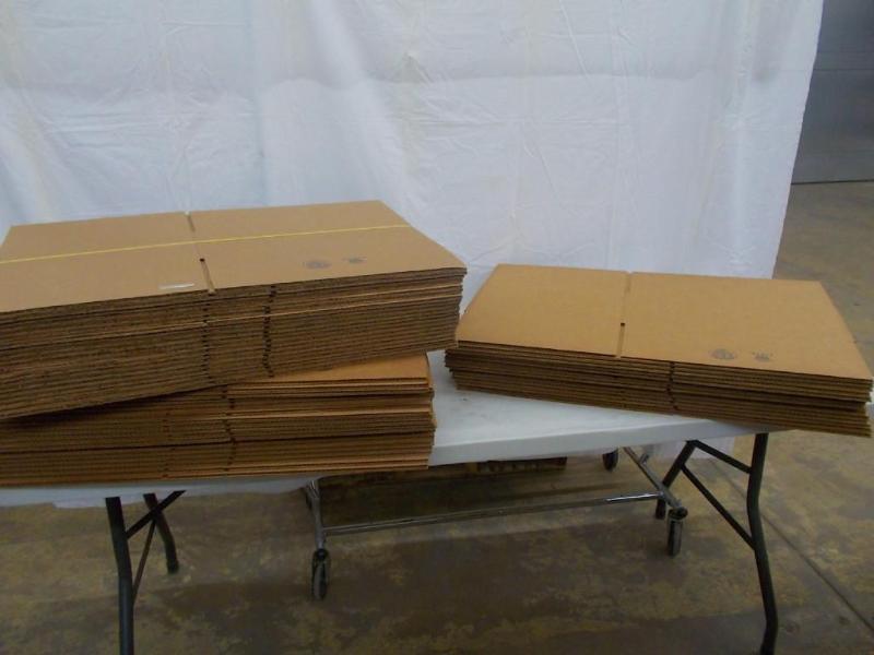 A bundle of 55 U-Line cardboard bro...