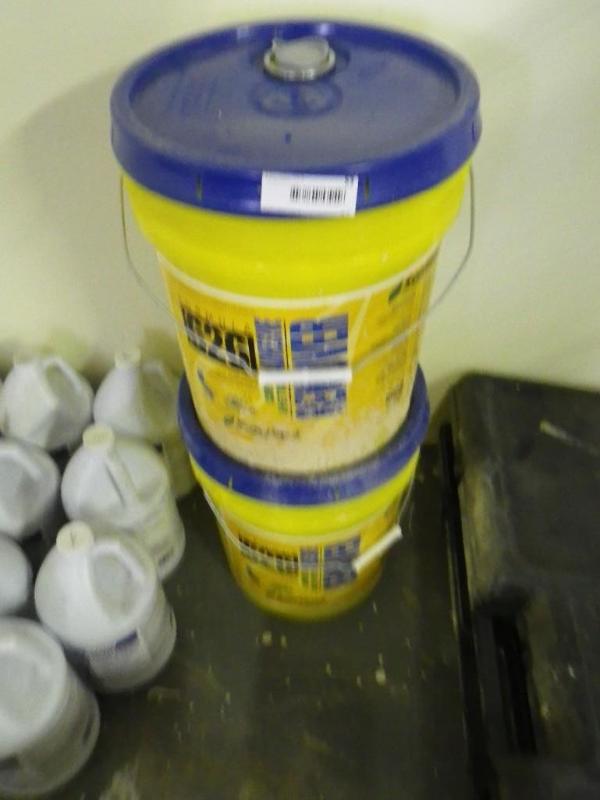 2 new pails of carpet adhesive...