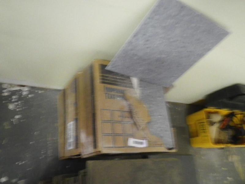 3 boxes of tile...