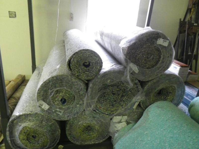 9 rolls of carpet padding...