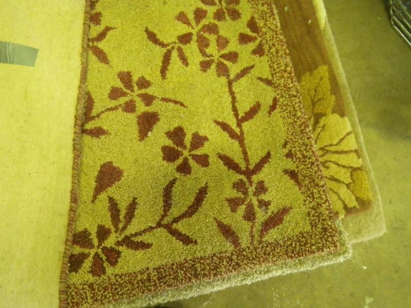 4 patterned area rugs...