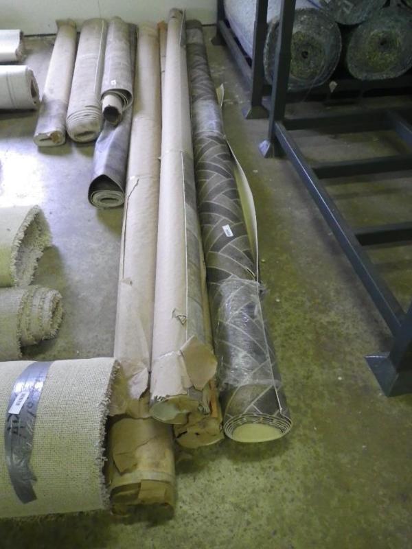 4 larger rolls linoleum...