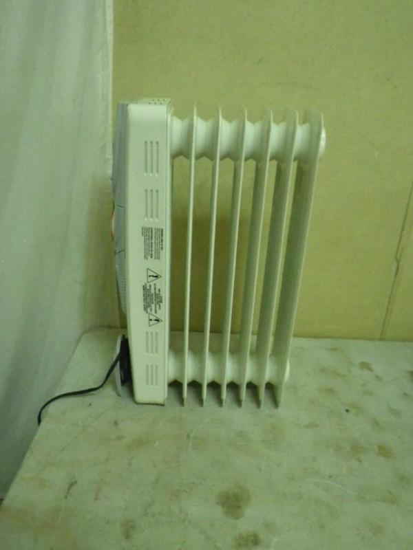 Optimus oil filled heater...