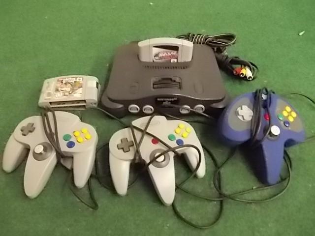 lot 42 image: Nintendo 64 Console With Cords, Con...