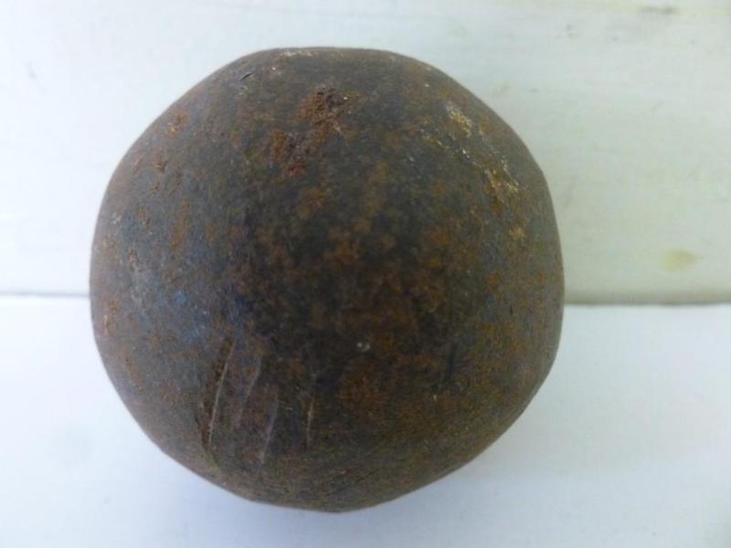 lot 51 image: Large steel cannon ball that measur...