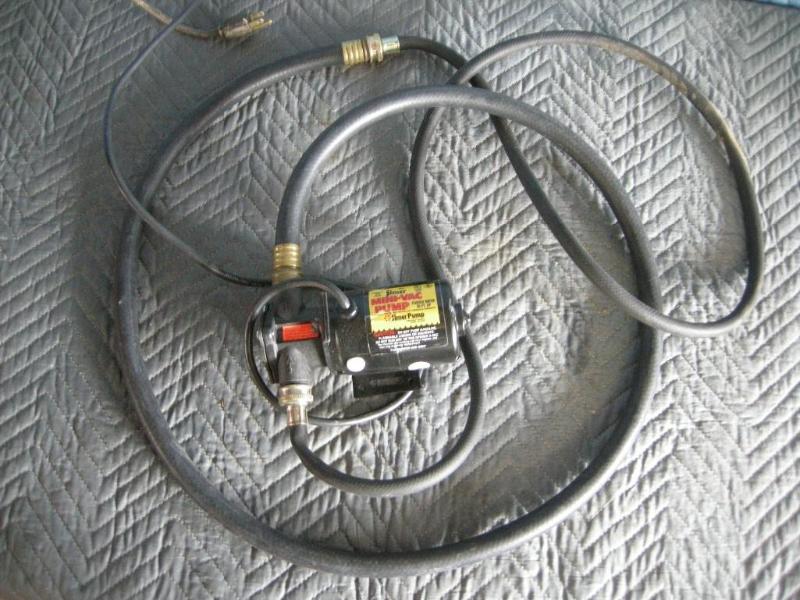 lot 110 image: Simer Mini-vac pump and hose