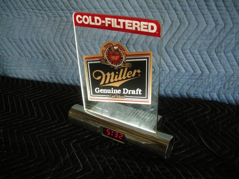 lot 24 image: MGD Cold Filtered lit signclock