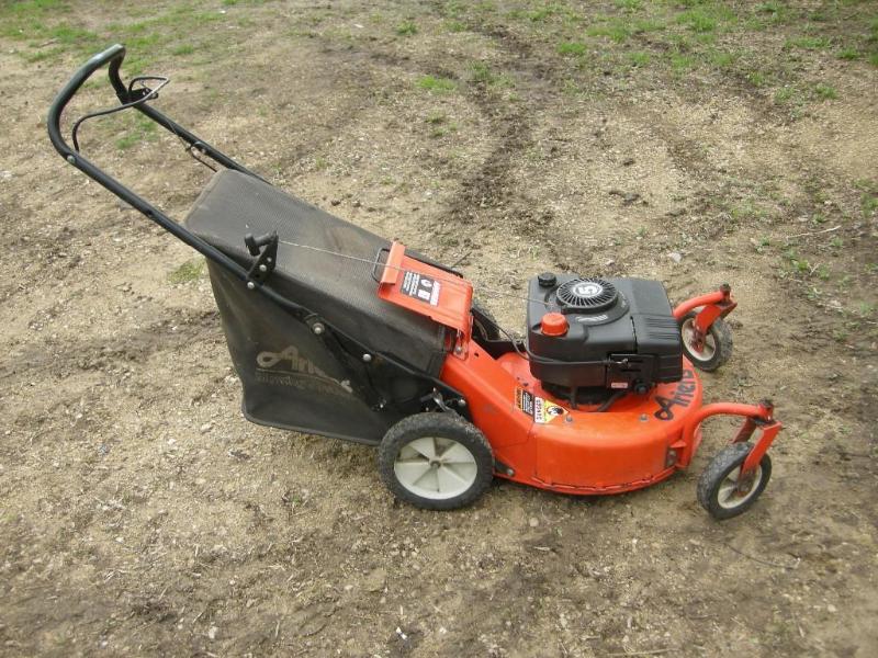 lot 54 image: Ariens Push mower with rear bag