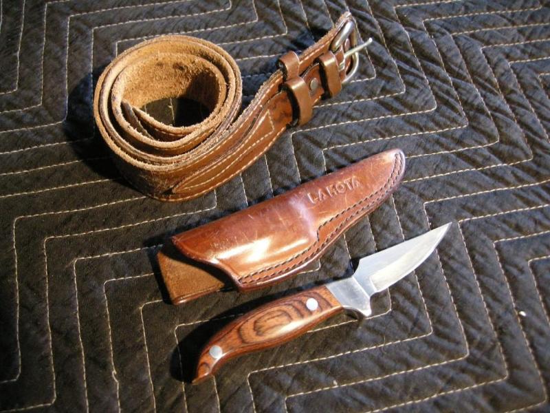 lot 76 image: Lakota Fin Wing hunting knife sheath