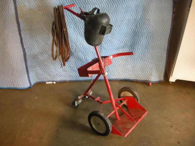 lot 9 image: 4 wheeled tank cart with mask etc
