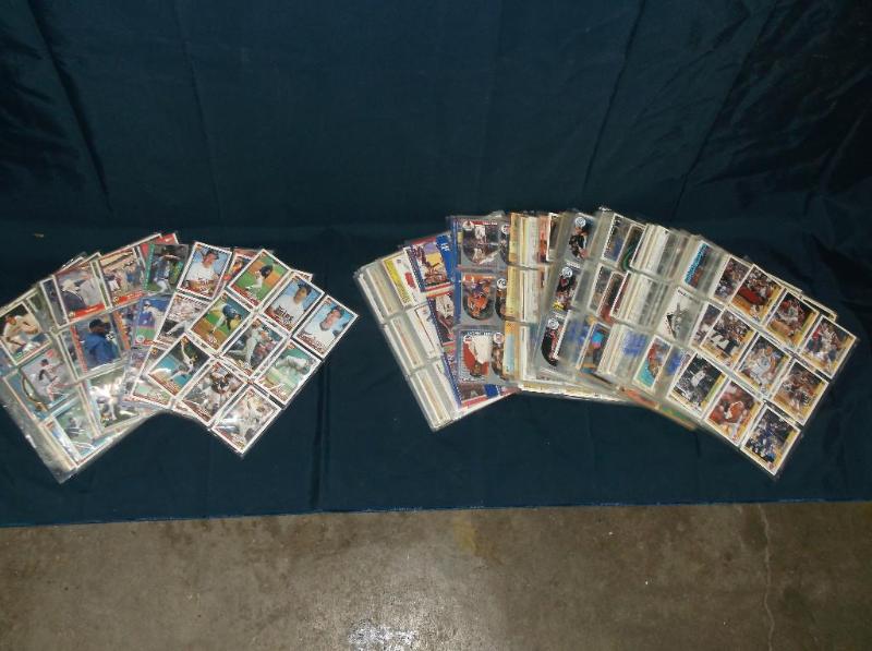 Pages of baseball and basketball ca...