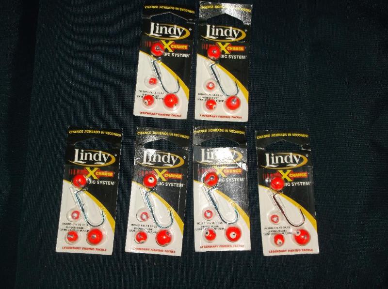 Six unopened packs of Lindy Lures...