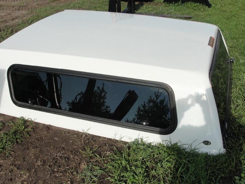 2006 Fiberglass Topper off of a 200...