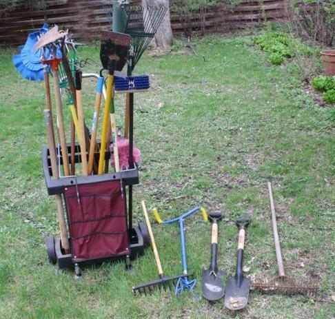 lot 231 image: Tool caddy with tools, shovels, rak...