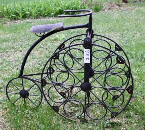 lot 232 image: Iron lawn ornament tricycle 26 x 23...