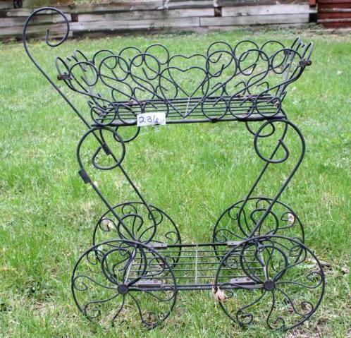 lot 236 image: Wire lawn ornament baby buggy 24 x ...