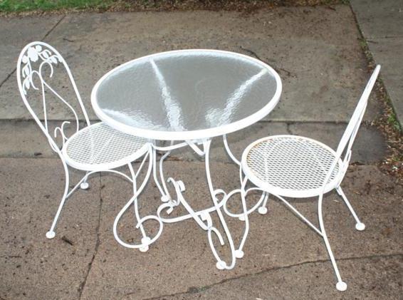 lot 304 image: Cast Iron patio table with glass to...