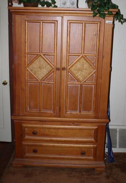 lot 52 image: Wood entertainment center 46 x 24 x...