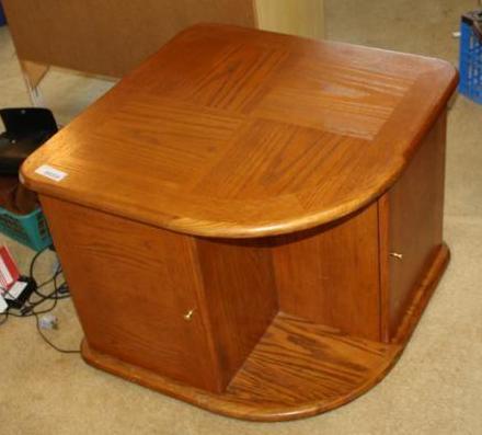 lot 55 image: Coffee table with cut out oront. Lo...