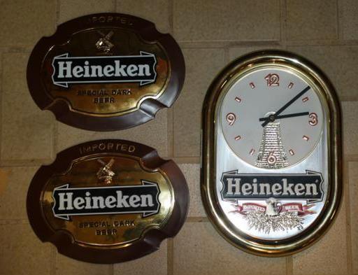 lot 75 image: Heineken clock 9.5 x 14 and two mat...