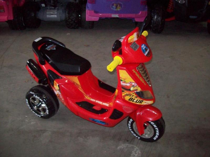 lot 22 image: Cars Scooter -New -6v -Comes with b...
