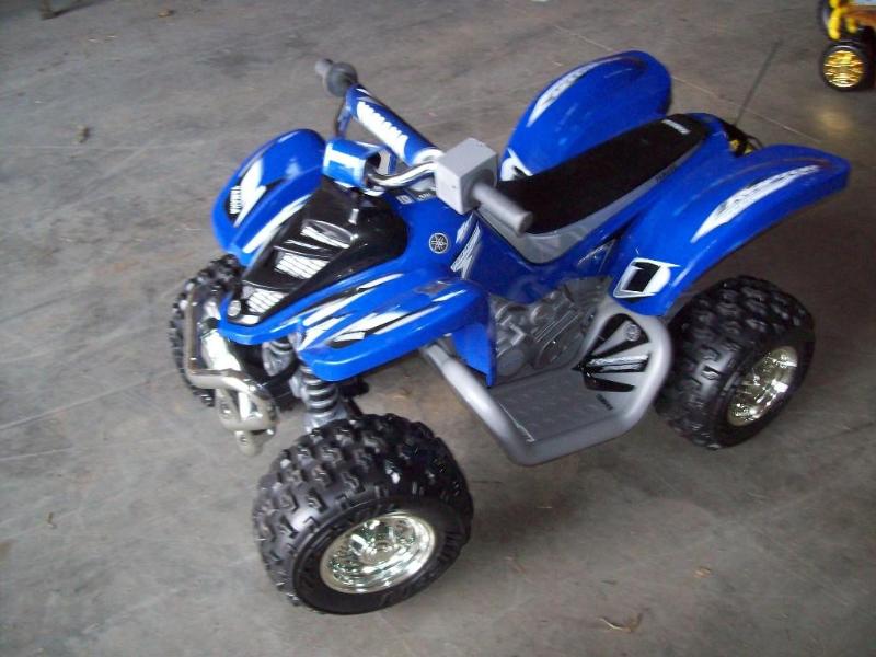 lot 9 image: Blue four wheeler -New -12v -comes ...