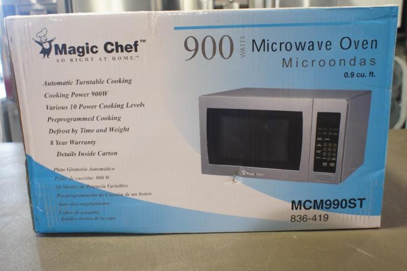 lot 22 image: New in Box Magic Chef Microwave  M...