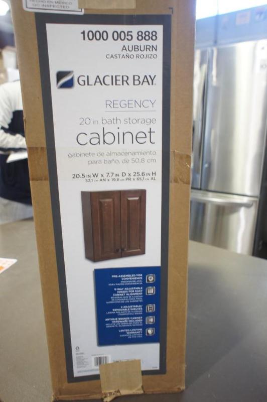 lot 24 image: New Glacier Bay Regency bath storag...