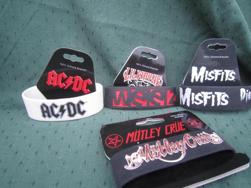 lot 147 image: Legend Bandz acdc etc 10 Bracelets...