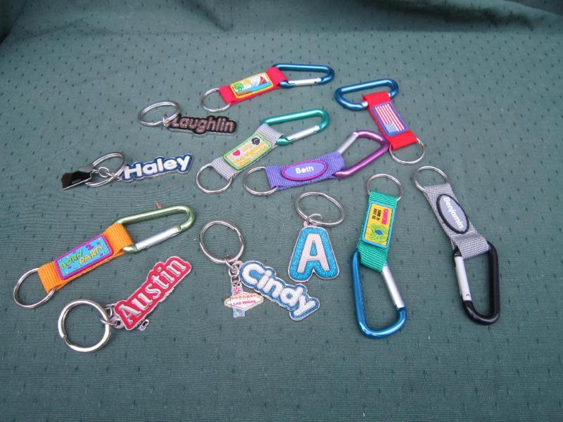 lot 149 image: 12 Key Chains -NEW...