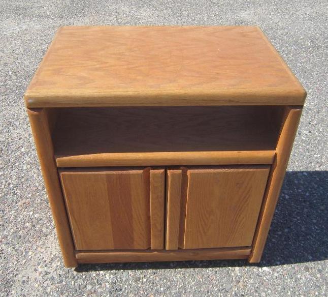 lot 3 image: TV Stand On rollers. Storage below ...