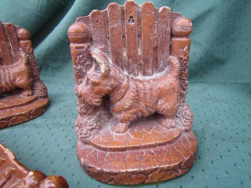 lot 38 image: 2 Scottie Dog clay bookends 1 leaf&...