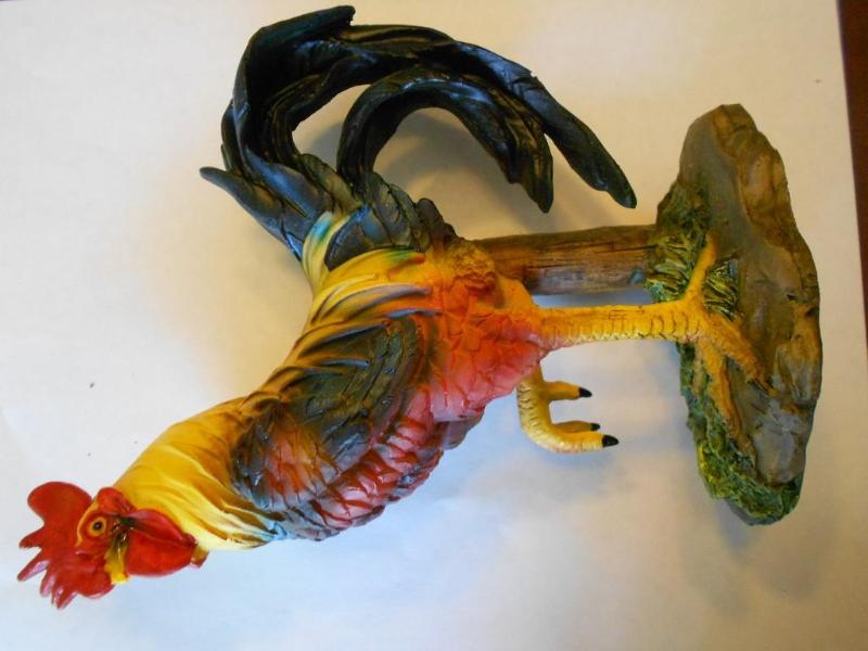 Rooster figurine stands about 7.5 i...
