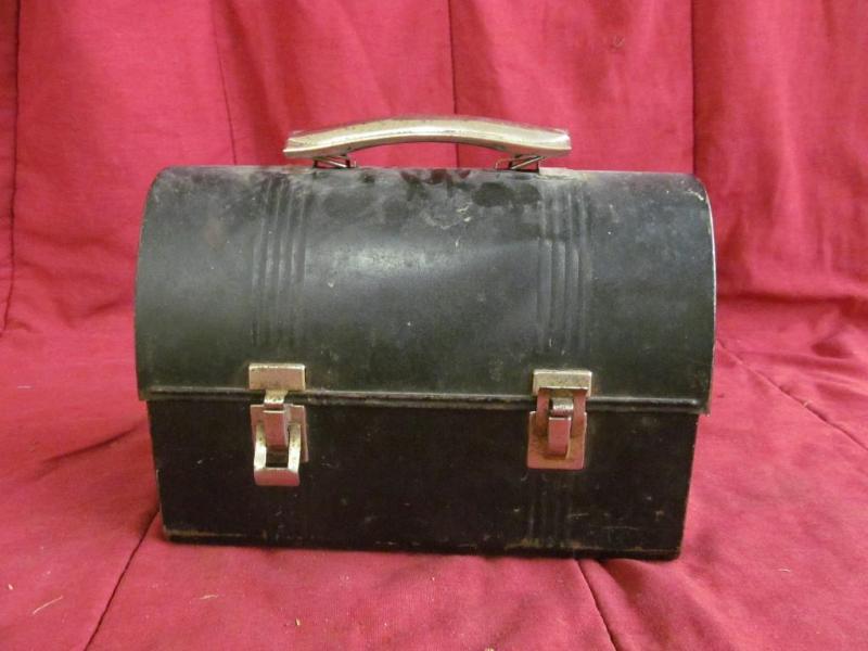 lot 21 image: Black Lunch Box...