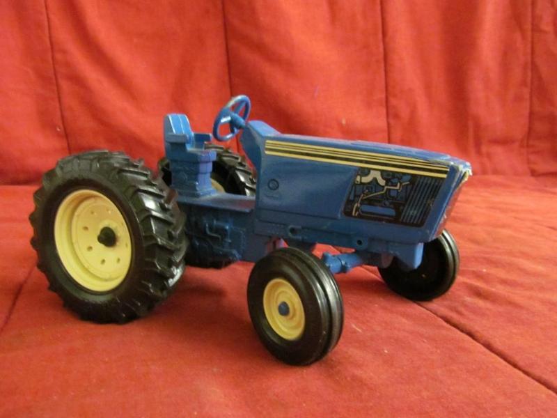 lot 242 image: Metal Ford Tractor, 8"...