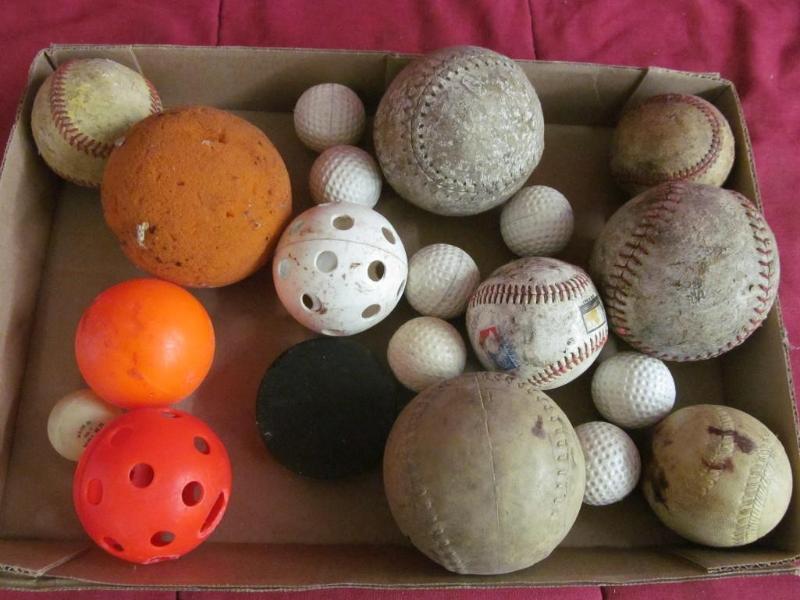 lot 62 image: Flat of various balls, golf, ping p...