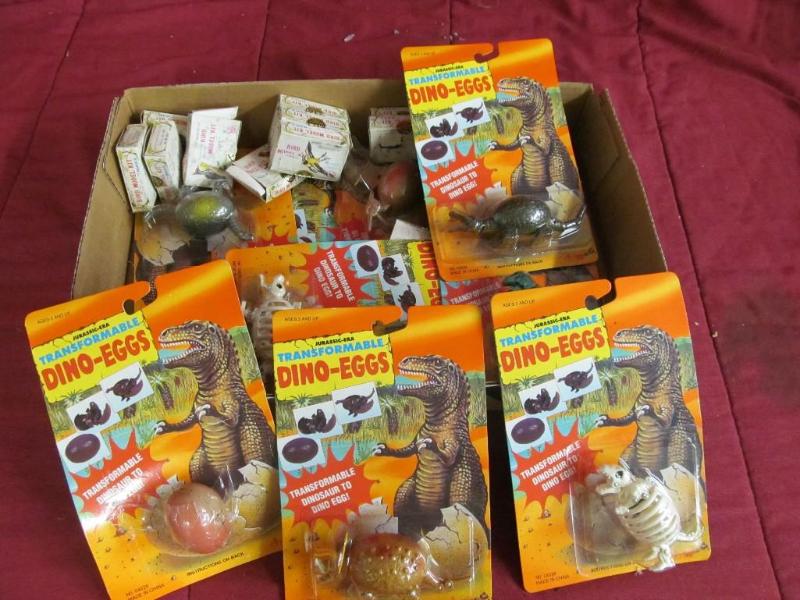 lot 89 image: Box full of Transformable dino eggs...